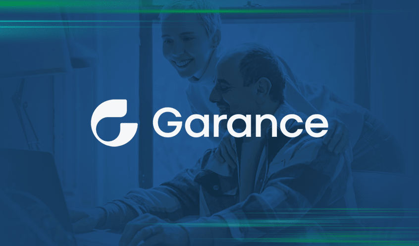 Garance company logo with a couple exploring insurance options on a laptop in the background.